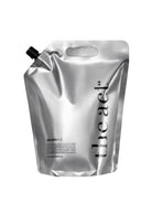 Silver packaging pouch with 'the aet' branding on a white background
