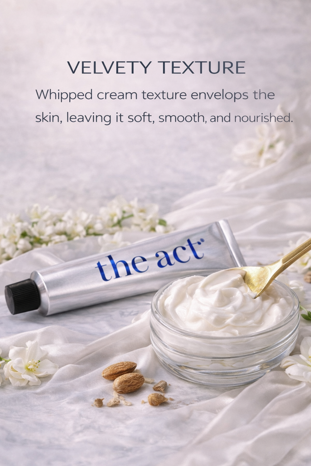 Jar of whipped cream with a tube labeled 'the act' on a light fabric background with flowers.